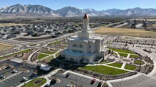 Desert Peaks Utah Temple  4k Aerial View [upl. by Derwon]