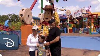 DisneyFamilia Watch Gloria amp Emilio Estefan Explore Toy Story Land [upl. by Annnora]