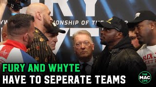 Tyson Fury and Dillian Whyte have to separate teams as tempers flare at first face off [upl. by Ahseer553]