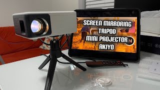 Mini Projector AKIYO 1080P Supported Portable Projector with Tripod 55000 Hours Multimedia [upl. by Lesirg]