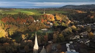 Aerial View of Light on Autumn Trees in Enniskerry Village County Wicklow Ireland [upl. by Doretta509]