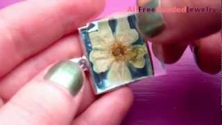 How to Make a Pressed Flower Pendant [upl. by Fi406]