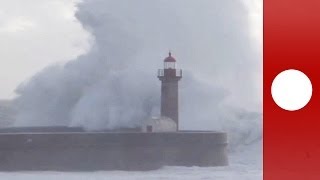 Atlantic storm Huge waves crash into lighthouse in Portugal [upl. by Mohammad]