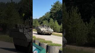 A couple of British warrior tanks driving past… [upl. by Tomkiel]