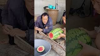 The process of cutting watermelon with steel knife [upl. by Ayat787]