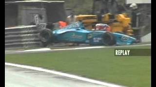 A marshal is dragged by Fisichellas Benetton at Spa in 2000 [upl. by Adnawahs]