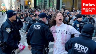 WATCH ProPalestinian Protesters Are Detained After Disrupting Macy’s Thanksgiving Day Parade [upl. by Yellek]