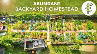 Couples Amazing Backyard Homestead Produces TONS of Food in the City  FULL GARDEN TOUR [upl. by Theobald654]