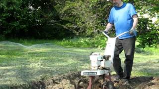 1973 Briggs 4HP Rototiller Attacks yard [upl. by Ahsaele]