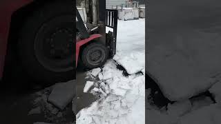 Removal process of frozen snow on the road [upl. by Rettke]