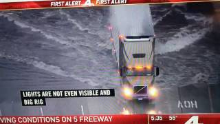 Storm Watch  Big rig crossing the flooded 5 freeway [upl. by Noivaz]