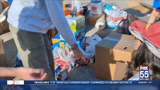 Homestead high school students helping to fill the truck [upl. by Asirram]