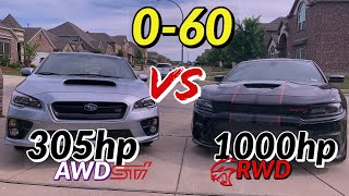 305hp WRX STI vs 1000hp Hellcat  060 on the street Unreal [upl. by Neelloj465]