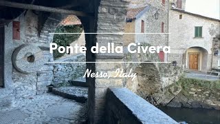 Drone footage of Ponte della Civera of Nesso Italy and beautiful waterfall behind it Lake Como [upl. by Ailana320]