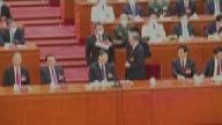 Chinas former leader helped off stage at NCCCP [upl. by Nnylatsirk]