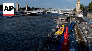 Paris 2024 director maintains confidence over Olympic triathlon swim on Seine River [upl. by Lenahc]