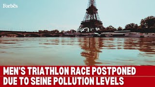 Paris Olympics Mens triathlon race postponed due to Seine pollution levels [upl. by Hploda]