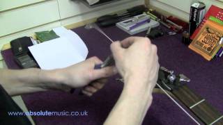 Absolute Music How to string a bass guitar [upl. by Hapte]