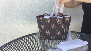 It is still on sale Unboxing Dooney and Bourke Monogram small Flynn [upl. by Onafets]