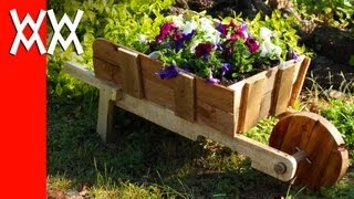 Make a rustic wheelbarrow garden planter Easy DIY weekend project [upl. by Naiva]