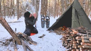 SOLO WINTER BUSHCRAFT CAMP Post Ice Storm Bowdrill Canvas Tipi Shelter [upl. by Hose869]