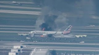 Panicked passengers flee fire on American Airlines flight [upl. by Enelyad516]