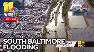 Cars buses stuck in water amid flooding in south Baltimore [upl. by Reba]