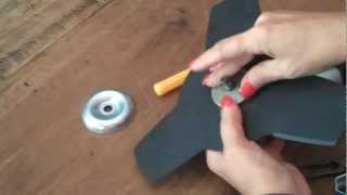 How to attach a blade to you Brush cutter attachment [upl. by Alleber]