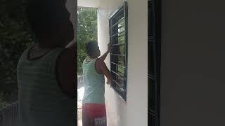 Skilled worker fixing grills in the windowdiy philippines [upl. by Alyak]