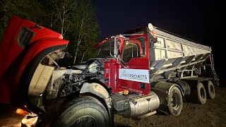 Spreading gravel with stone slinger truck inside building [upl. by Gretchen]