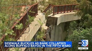 Complexs sidewalk retaining wall buckles next to Buffalo Bayou [upl. by Idnarb]