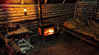 Warm and Cozy Tiny Bushcraft Cabin with Wood Stove – Winter Camping in Rain [upl. by Leirum]