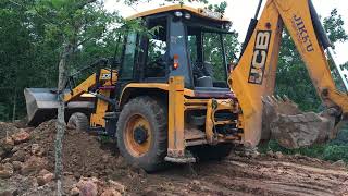 jcb 3dx levelling land by pushing soil using fronthoe [upl. by Willtrude867]