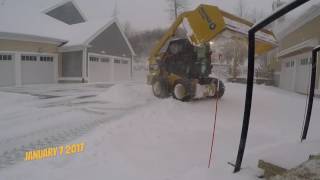 CAT 236D plowing driveways [upl. by Hgierb846]