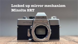 Minolta SRT  Locked up mirror mechanism [upl. by Nryhtak]