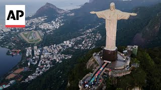 Christ the Redeemer decorated with colorful carpet to celebrate Corpus Christi [upl. by Mortensen811]