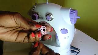 How To Wind A Bobbin On A Portable Mini Sewing Machine [upl. by Garibull]