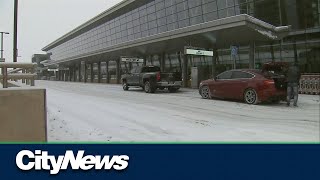 Winter weather delays expected at Calgary airport [upl. by Atteniuq]