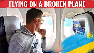 Review BROKEN RWANDAIR DASH8 PLANE  CHASING KILIMANJARO [upl. by Norvan]