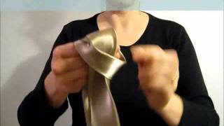 How to tie a tie in 5 seconds Video tutorial of krawattenknoteninfo [upl. by Naimaj]