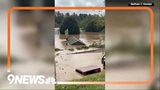 Roof floats by in extreme flooding in Asheville North Carolina [upl. by Ycnaffit308]