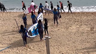 Barceloneta beachChildren enjoying paddle board riding [upl. by Wertz354]