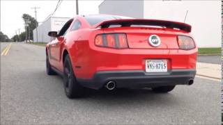 2010 Mustang GT Stock Exhaust vs BBK XPipe w Flowmaster Outlaw Series Axleback Startup amp Takeoff [upl. by Annatnom]