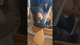 CHAINSAWCARVED BEAR PADDLING A CANOE woodworking chainsawcarving bearcarving [upl. by Jania183]