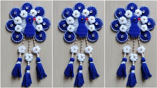 Diy easy woolen peacock flower wall hanging craftWoolen wall hanging craftPeacock craftSJcraft [upl. by Ydac852]