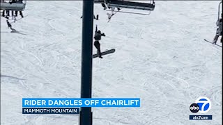 Snowboarder at Mammoth Mountain slips out of chair lift falls to ground [upl. by Ilyse]