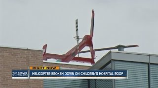 Broken helicopter stuck atop Childrens Hospital in Aurora [upl. by Eanel330]