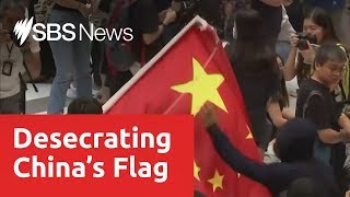 Hong Kong protesters desecrate Chinese flag as they vandalise shopping centre [upl. by Duile651]