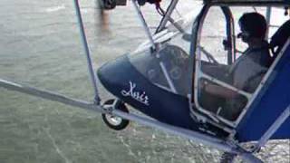 Microlight flying  low level along the Norfolk coast [upl. by Seale82]