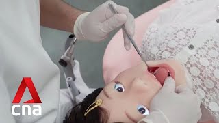 Humanoid robot helps train paediatric dentists in Japan [upl. by Ayatahs762]